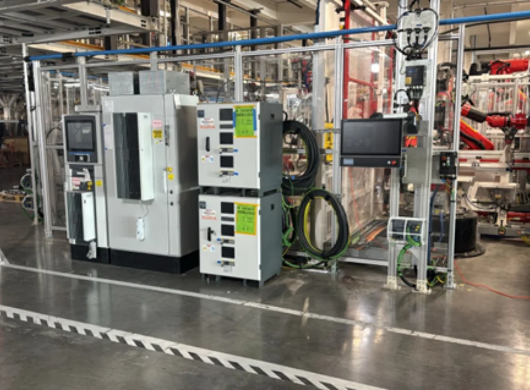 Automation robot operating on Tesla production line during W68 project integration